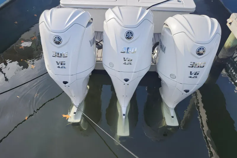 Slide: The Image of Triple Yamaha 300 V6 outboard engines on a 2022 Regulator 34 boat. - 49