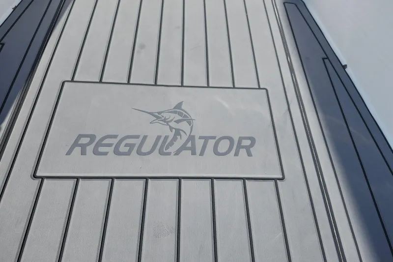 Slide: The Image of 2022 Regulator 34 boat deck with logo and marlin design. - 50
