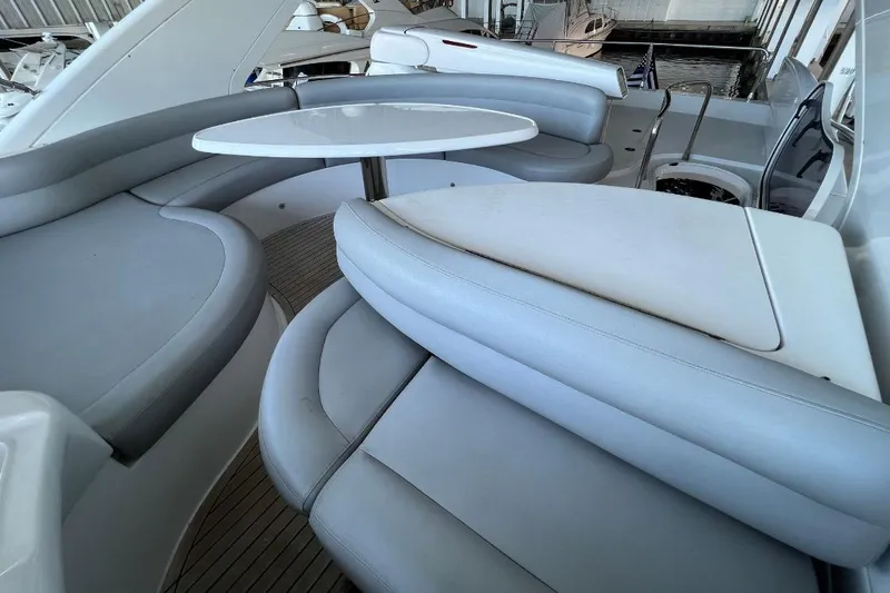Slide: The Image of Luxurious seating area on a 2006 Azimut FLY 55 yacht with sleek design. - 2