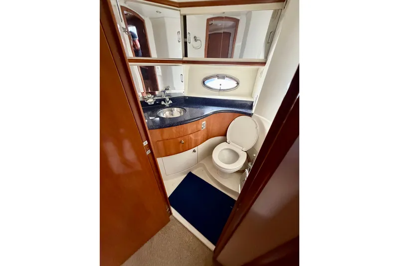 Slide: The Image of Bathroom interior of 2002 Carver 444 Cockpit Motor Yacht with sink and toilet. - 18