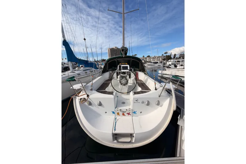 Slide: The Image of 1995 Beneteau Oceanis 351 sailboat docked at marina, clear sky background. - 15