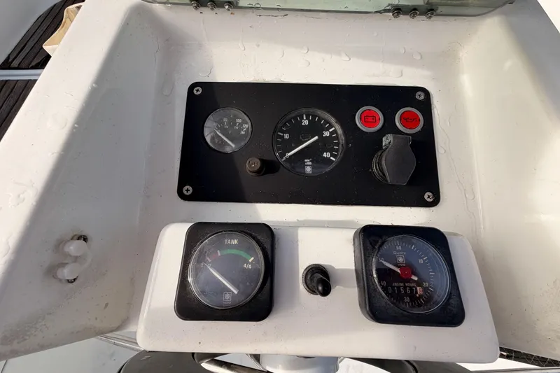 Slide: The Image of Control panel of a 1995 Beneteau Oceanis 351 sailboat with gauges and switches. - 19