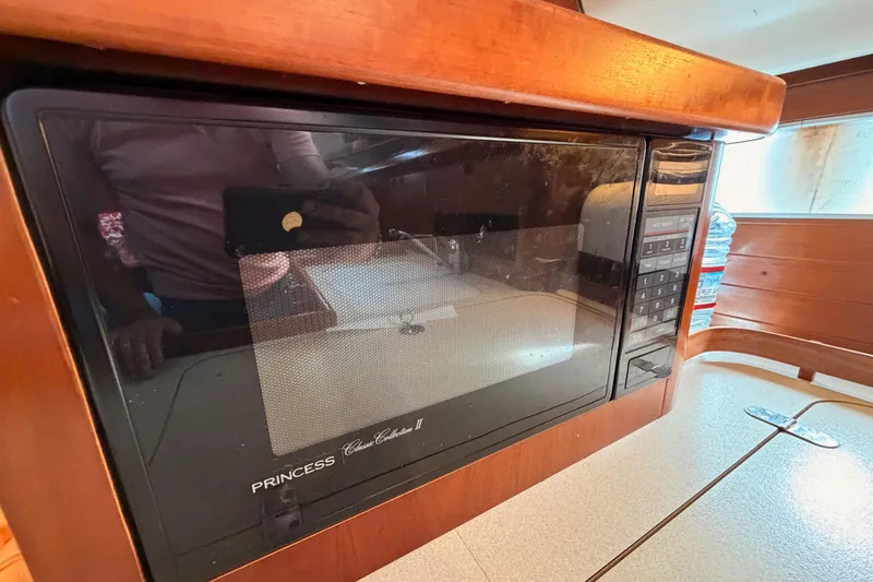 Slide: The Image of Microwave in 1995 Beneteau Oceanis 351 yacht kitchen interior. - 38