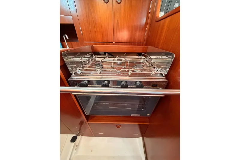 Slide: The Image of Galley stove and oven in 1995 Beneteau Oceanis 351 sailboat interior. - 40