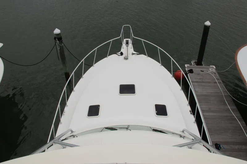 Slide: The Image of Top view of 2016 Henriques 42 Express Hardtop docked at marina. - 12