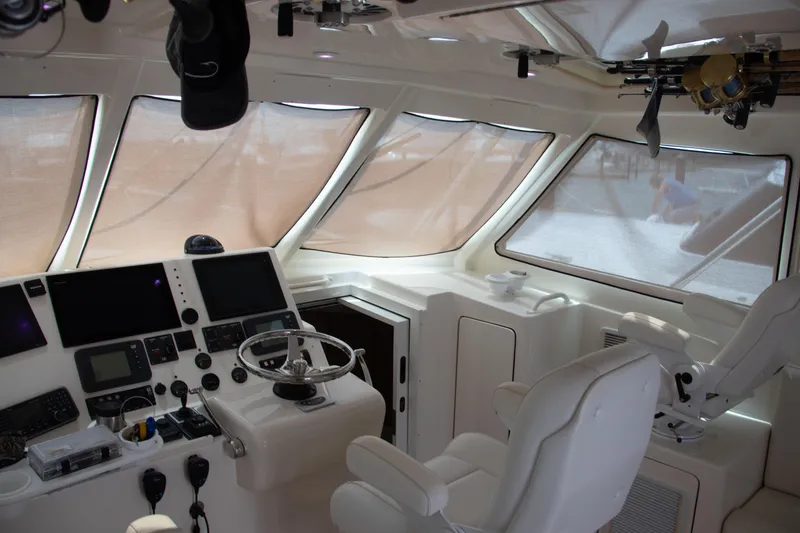 Slide: The Image of Interior of 2016 Henriques 42 Express Hardtop boat with modern navigation equipment. - 17