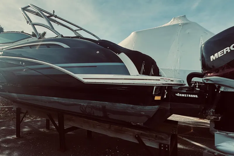 Slide: The Image of 2019 Formula 310 FX Bowrider boat with Mercury engine on display. - 10