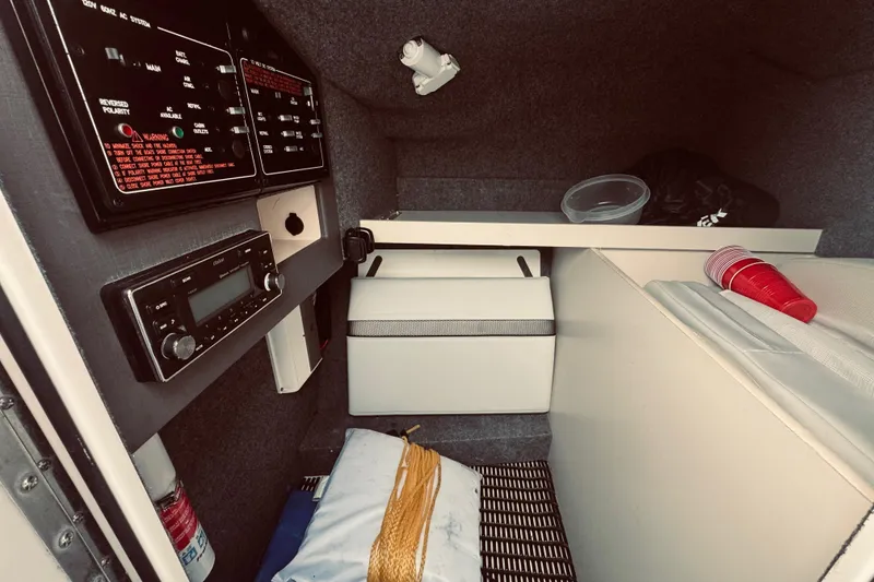 Slide: The Image of Interior cabin of 2019 Formula 310 FX Bowrider with control panels and seating. - 21