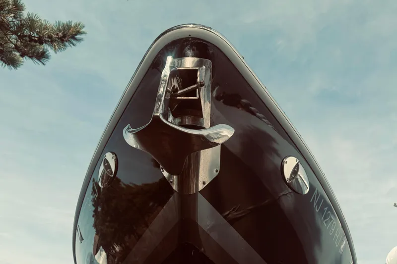 Slide: The Image of 2019 Formula 310 FX Bowrider boat, close-up of bow against blue sky. - 7