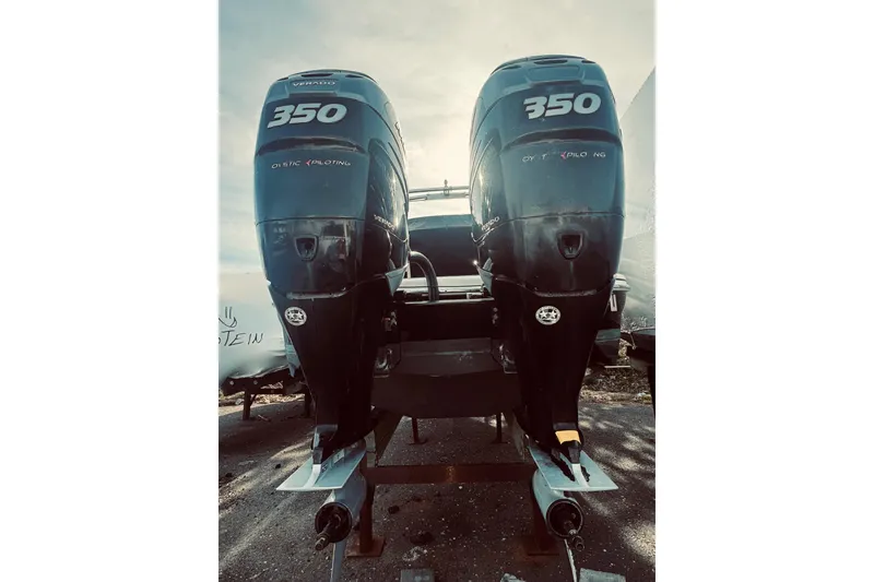 Slide: The Image of Twin 350 Verado outboard engines on a 2019 Formula 310 FX Bowrider boat. - 8