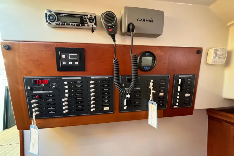 Slide: The Image of Electrical control panel on a 2010 Back Cove 33 Express Hardtop boat. - 21