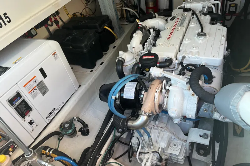 Slide: The Image of Engine room of 2010 Back Cove 33 Express Hardtop with Cummins engine and Kohler power system. - 27