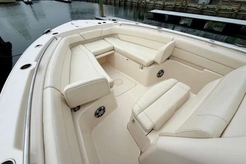 Slide: The Image of 2022 Grady-White Canyon 271 boat interior with luxurious seating and sleek design. - 10