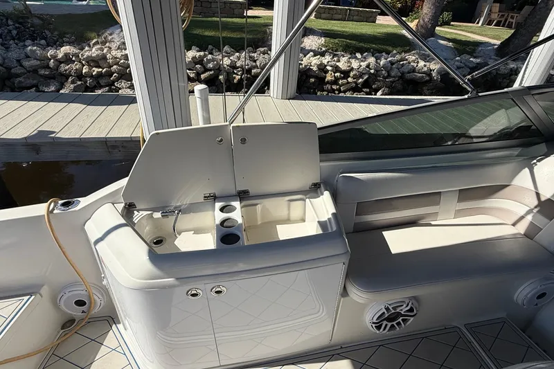 Slide: The Image of 1999 Formula 280 Sun Sport boat interior with steering wheel and control panel. - 11