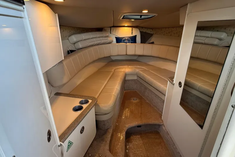 Slide: The Image of 1999 Formula 280 Sun Sport boat dashboard with steering wheel and gauges. - 12