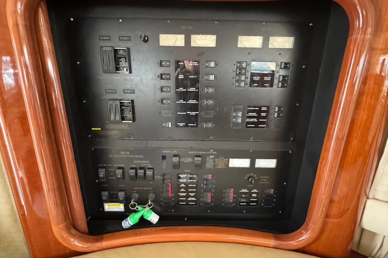 Slide: The Image of Electrical control panel on a 2004 Sea Ray 560 Sedan Bridge yacht. - 17
