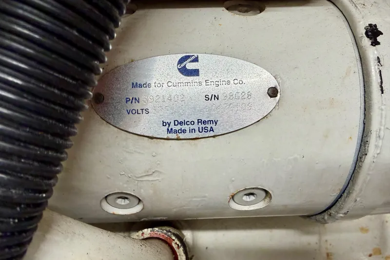 Slide: The Image of Label on Cummins engine part, Carver 530 Voyager Pilothouse 1999, by Delco Remy, Made in USA. - 62