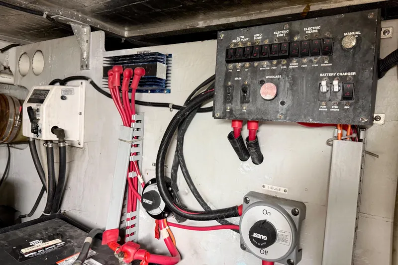 Slide: The Image of Electrical panel and wiring in a 1999 Carver 530 Voyager Pilothouse boat. - 63