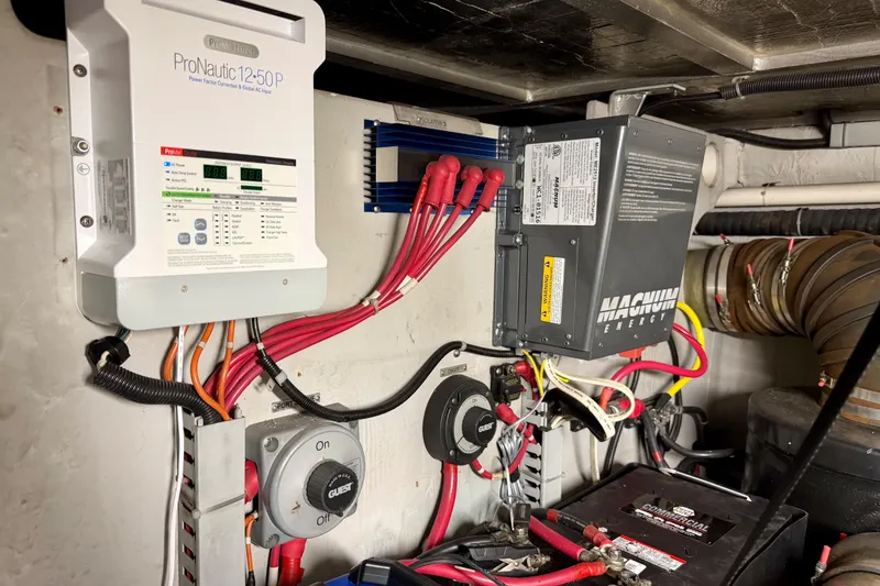 Slide: The Image of Electrical system components in a 1999 Carver 530 Voyager Pilothouse boat. - 65