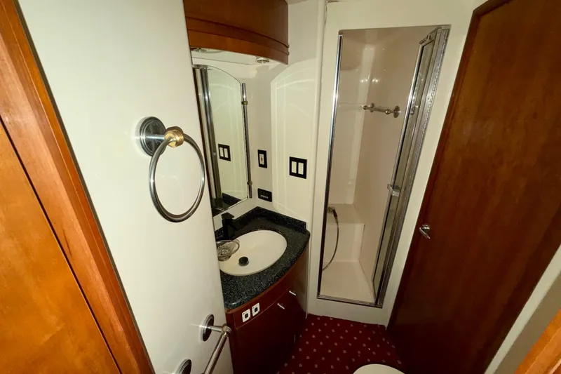 Slide: The Image of Bathroom interior of 1999 Carver 530 Voyager Pilothouse with shower and sink. - 25
