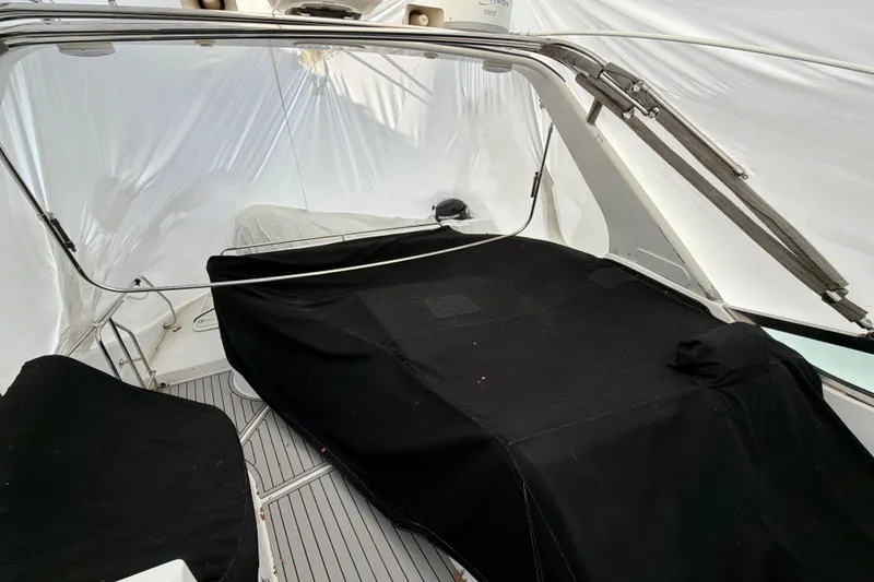 Slide: The Image of Interior view of 1999 Carver 530 Voyager Pilothouse with covered seating area. - 43