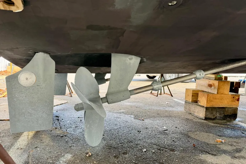 Slide: The Image of Propeller and rudder of 1999 Carver 530 Voyager Pilothouse on dry dock. - 49