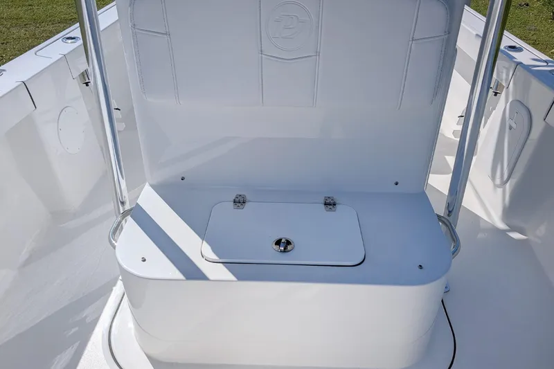 Slide: The Image of 2026 Parker 18SE Center Console boat interior with storage compartment. - 11