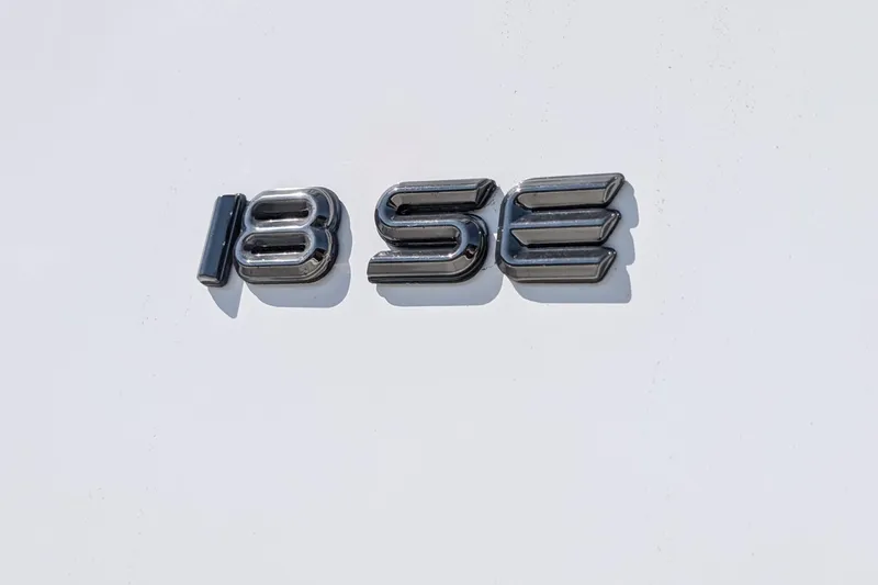 Slide: The Image of Chrome "18SE" emblem on 2026 Parker Center Console boat. - 20