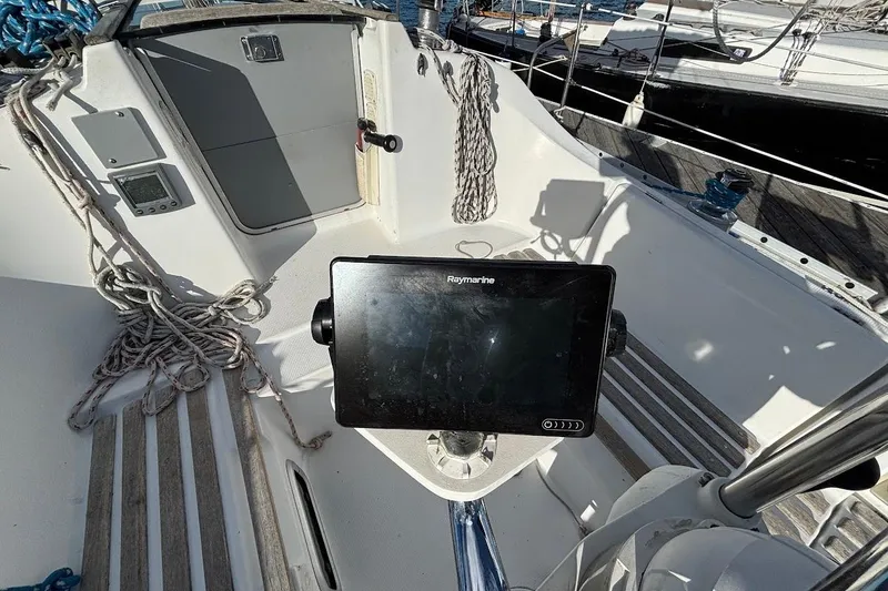 Slide: The Image of Cockpit of 1993 Beneteau First 310 sailboat with Raymarine navigation system. - 6