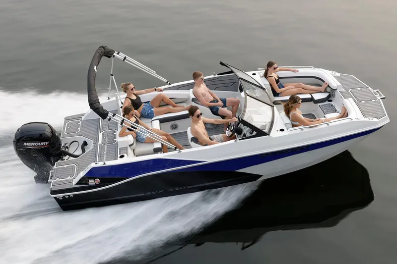 The Image of Manufacturer Provided Image: 2025 Starcraft SVX 210 OB boat cruising with passengers on a calm lake. - 0