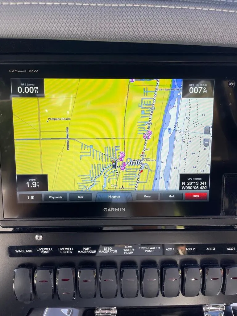 Slide: The Image of Garmin GPS display on 2019 Blackfin 272 CC boat dashboard, showing navigation map. - 19