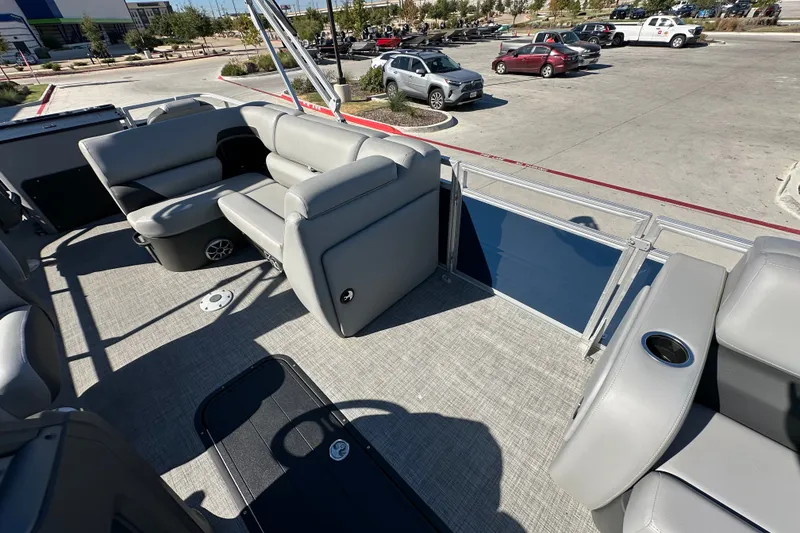 Slide: The Image of Interior of 2026 Sun Tracker SportFish 22 XP3 pontoon boat with gray seating. - 17