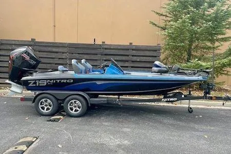 The Image of 2026 Nitro Z19 XL Pro boat on trailer, parked outdoors. - 0