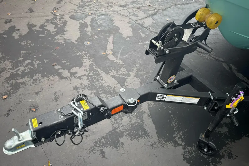 Slide: The Image of Trailer hitch of 2026 Tahoe T18 on a paved surface. - 11