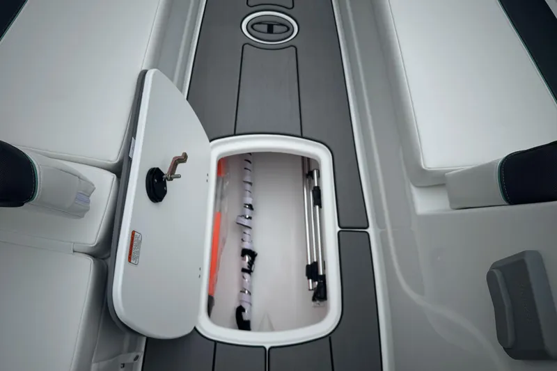 Slide: The Image of 2026 Tahoe T18 boat storage compartment with open hatch, showcasing interior space. - 16