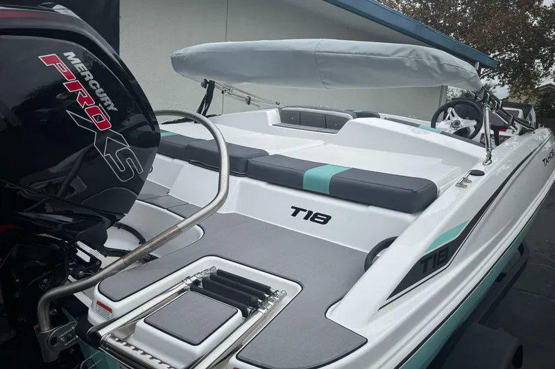Slide: The Image of 2026 Tahoe T18 boat with Mercury Pro XS engine, featuring sleek design and modern amenities. - 5