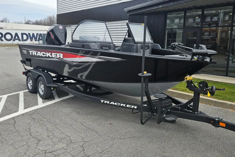 The Image of 2026 Tracker Targa V-19 Combo boat on trailer, parked outdoors. - 0