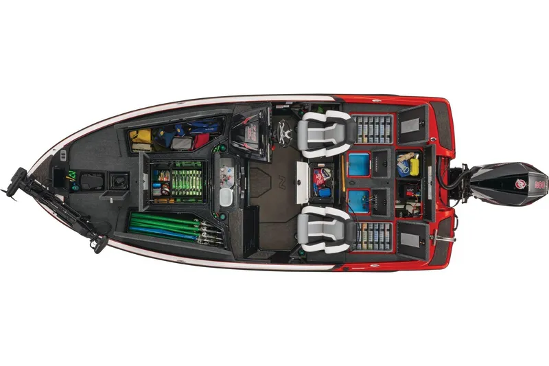 Slide: The Image of 2026 Nitro Z19 XL boat with open storage compartments in a parking lot. - 8