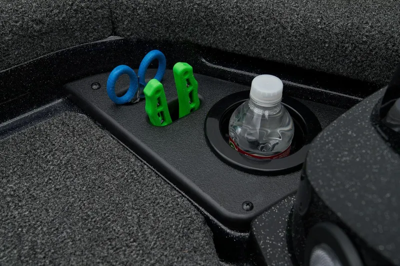 Slide: The Image of Interior storage compartment of 2026 Nitro Z21 XL Pro boat, showcasing rod holders. - 31