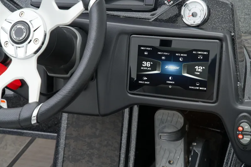 Slide: The Image of Interior of 2026 Nitro Z21 XL Pro boat with blue and gray seating. - 37