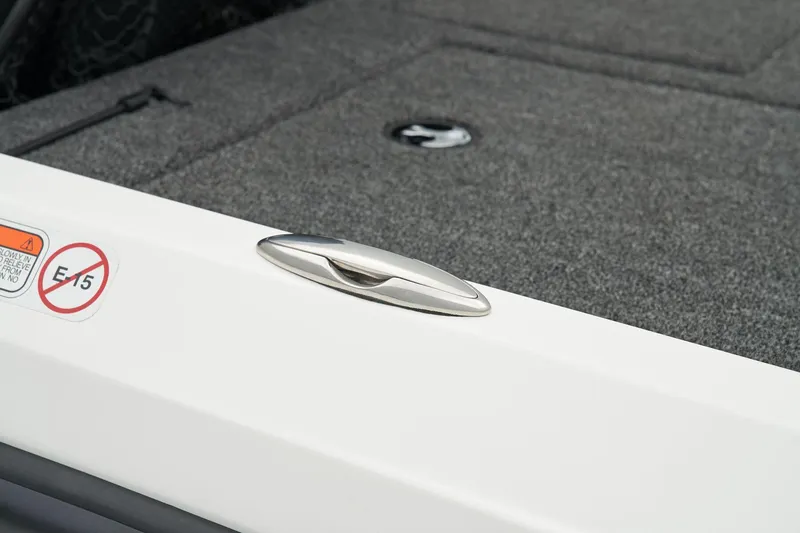 Slide: The Image of 2026 Nitro Z21 XL Pro boat interior with blue and gray seats, carpeted flooring. - 46