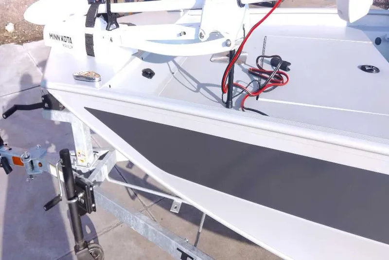 Slide: The Image of 2026 Tracker Bass Tracker Classic CC boat on trailer with Minn Kota trolling motor. - 2