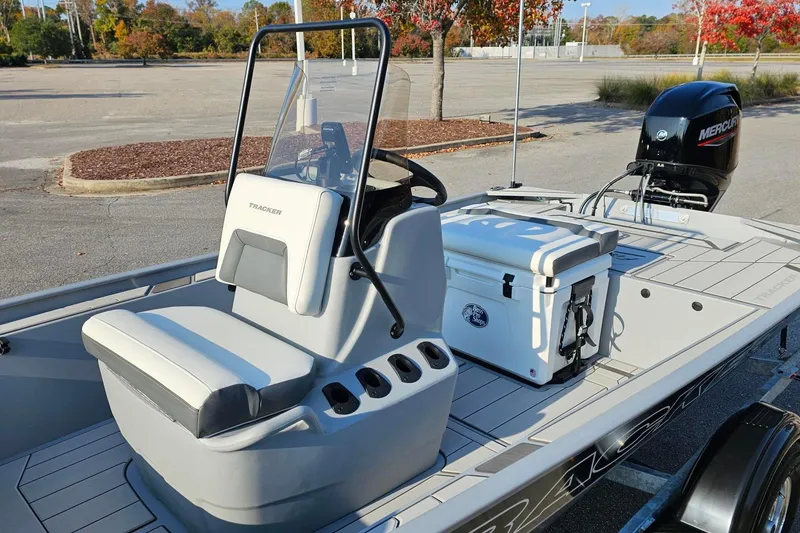 Slide: The Image of 2026 Tracker Bass Tracker Classic CC boat with seating and Mercury outboard motor. - 12