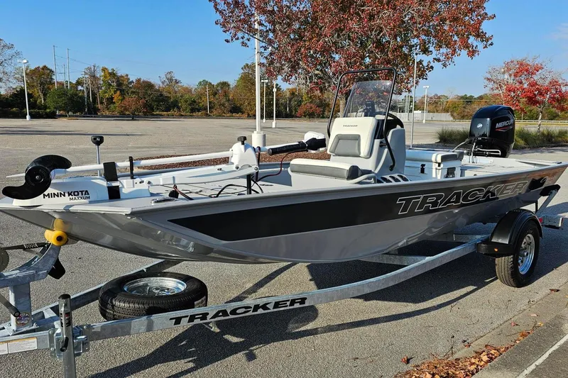 Slide: The Image of 2026 Tracker Bass Tracker Classic CC boat on trailer in parking lot. - 14