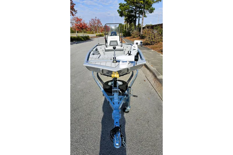 Slide: The Image of 2026 Tracker Bass Tracker Classic CC boat on trailer, parked on a road. - 7