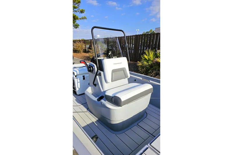 Slide: The Image of 2026 Tracker Bass Tracker Classic CC boat with sleek seating and console design. - 9