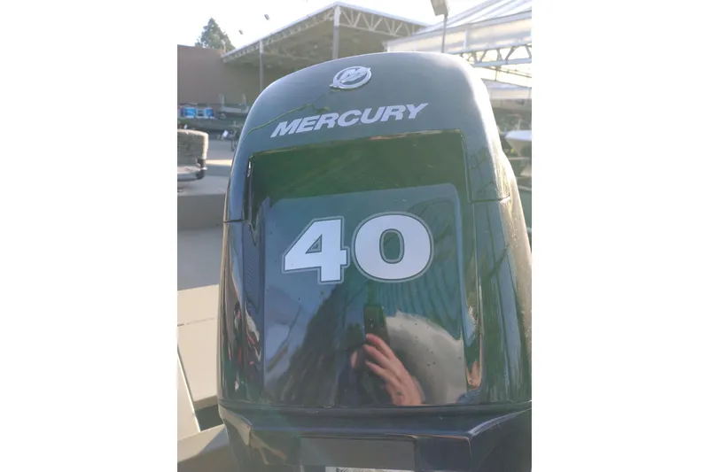 Slide: The Image of Mercury 40 horsepower outboard motor on 2026 Tracker Grizzly 1654 T Sportsman boat. - 3
