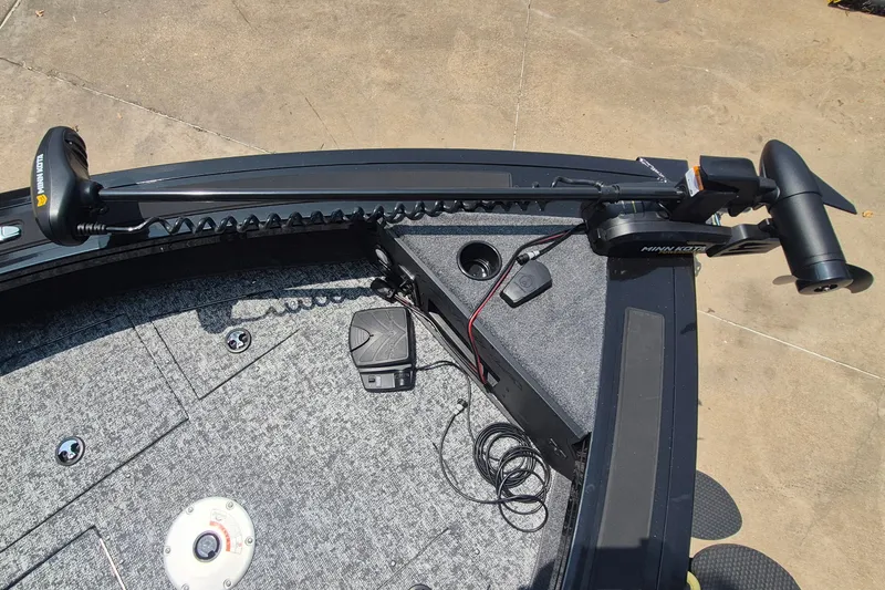 Slide: The Image of 2026 Tracker Targa V-19 WT boat deck with Minn Kota trolling motor. - 13