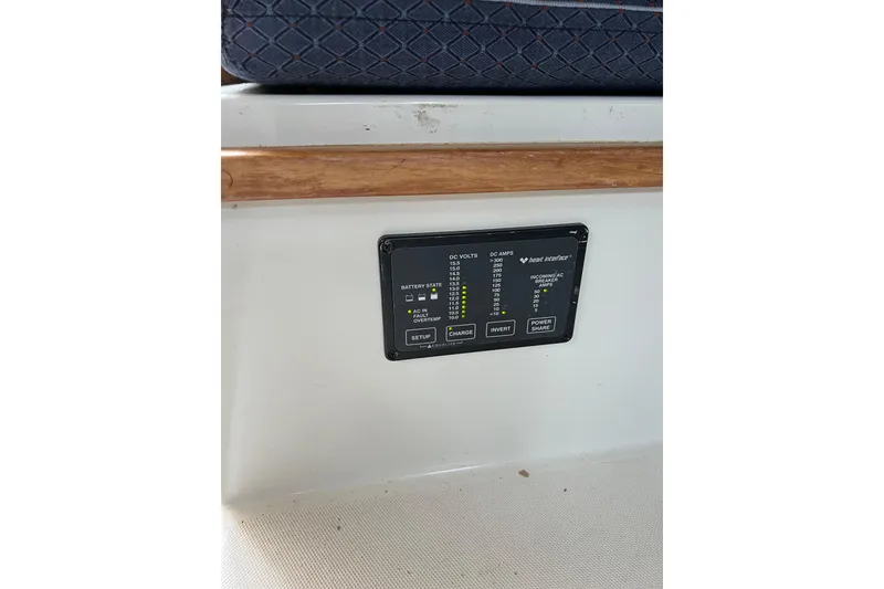 Slide: The Image of Control panel on 2001 Skipjack 262 Flybridge boat, displaying battery and power settings. - 15