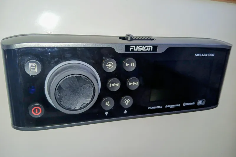 Slide: The Image of Fusion MS-UD750 marine stereo system on Skipjack 262 Flybridge, 2001 model. - 16